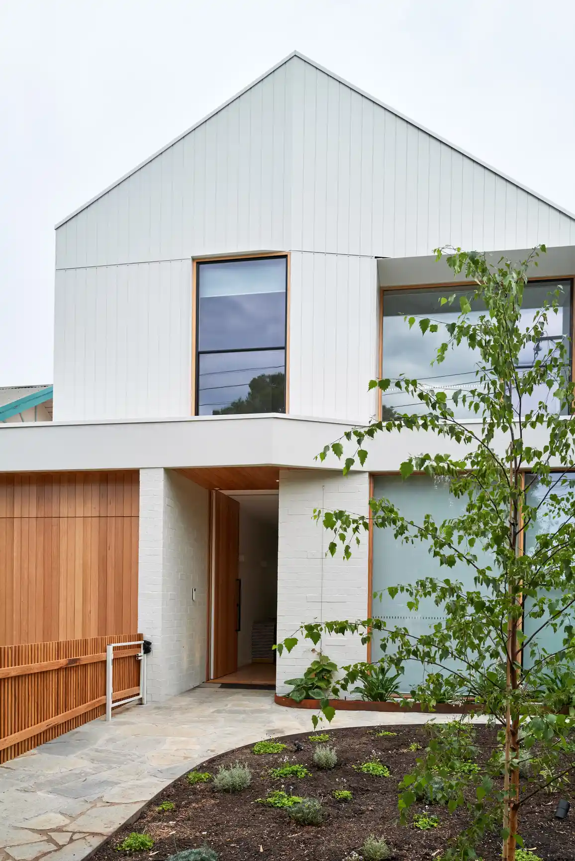 A modern home with solar panels installed on the roof, promoting sustainable energy use and eco-friendly living.